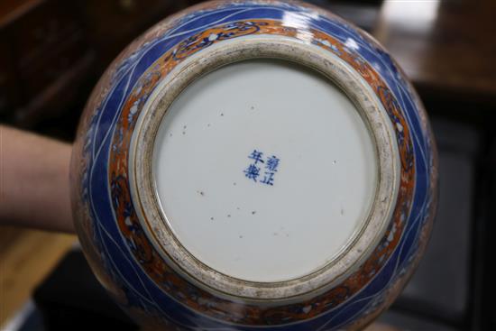 A Chinese doucai dragon ovoid jar and cover, Yongzheng four character mark but 19th century, height 24.5cm excl. wood stand